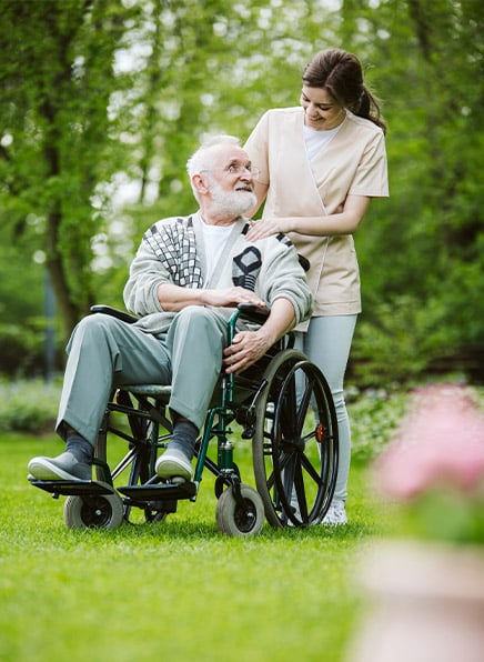 senior man on the wheelchair in the garden